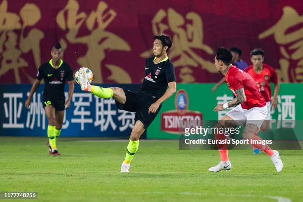Kenyu Sugimoto of Urawa Red Diamonds in action during the AFC Champions League Semi Final second leg match between Guangzhou Evergrande and Urawa Red...