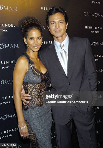 Halle Berry and Benjamin Bratt during Warner Bros. Consumer Products and Henri Bendel Host Purr-fect "Catwoman" - After Party at Henri Bendel in New...