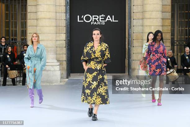 Caroline Receveur, Marie Bochet and Leomie Anderson walk the runway during the "Le Defile L'Oreal Paris" Show as part of Paris Fashion Week on...