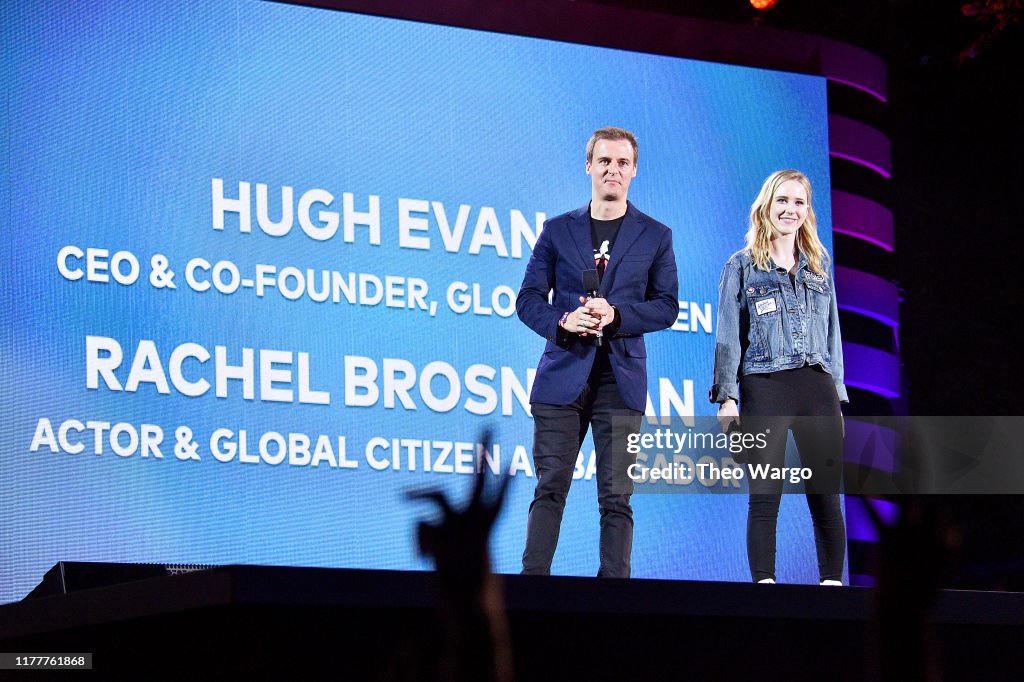 Global Citizen CEO Hugh Evans and Rachel Brosnahan speak onstage