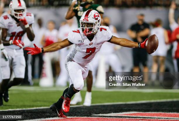 Jahcour Pearson of the Western Kentucky University Hilltoppers celebrates scoring a touchdown during the game with the University of Alabama...