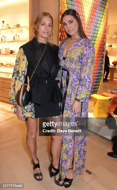 Yasmin Le Bon and Amber Le Bon attend the re-opening of the Louis Vuitton New Bond Street Maison on October 23, 2019 in London, England.