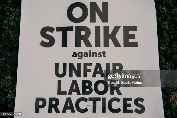 Demonstrator's sign sits on a hedge in downtown Chicago following a march to show support for the ongoing teachers strike on October 23, 2019 in...