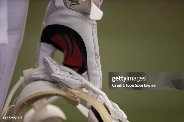 Member of the University of Louisiana-Monroe football team holds his helmet during a game between the Louisiana-Monroe Warhawks and the Appalachian...