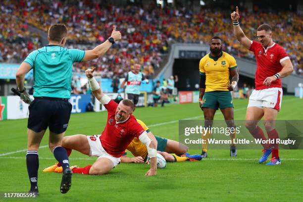 Hadleigh Parkes of Wales celebrates scoring his sides first try during the Rugby World Cup 2019 Group D game between Australia and Wales at Tokyo...