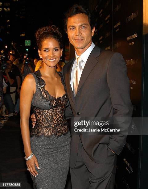 Halle Berry and Benjamin Bratt during Warner Bros. Consumer Products and Henri Bendel Host Purr-fect "Catwoman" - After Party at Henri Bendel in New...