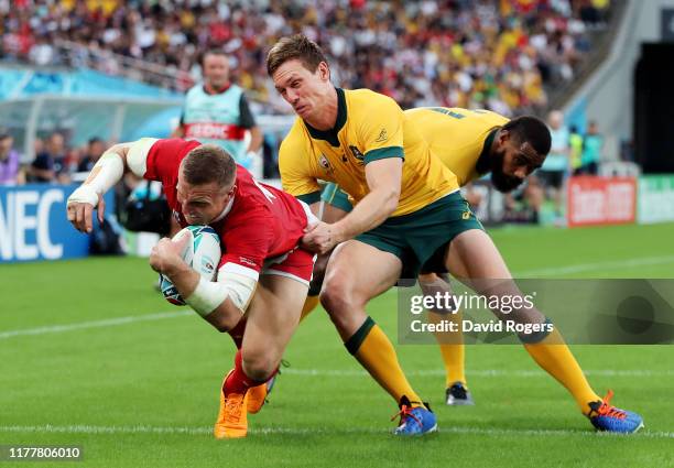 Hadleigh Parkes of Wales goes over to score his team's first try during the Rugby World Cup 2019 Group D game between Australia and Wales at Tokyo...