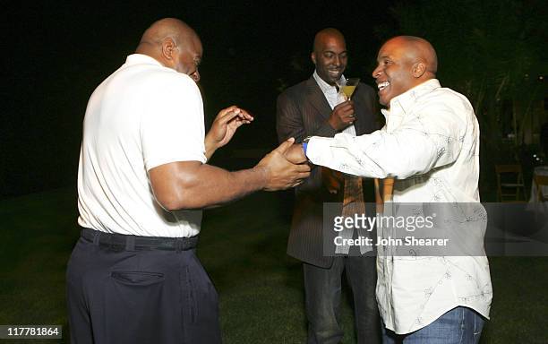Magic Johnson, John Salley and Barry Bonds during HollyRod/ True Religion Brand Jeans Fundraiser - November 19, 2005 at Private Residence in Beverly...