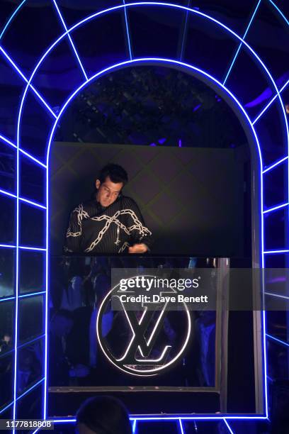 Mark Ronson performs at an after party celebrating the re-opening of the Louis Vuitton New Bond Street Maison at Annabel's on October 23, 2019 in...