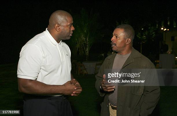 Magic Johnson and Carl Weathers during HollyRod/ True Religion Brand Jeans Fundraiser - November 19, 2005 at Private Residence in Beverly Hills,...