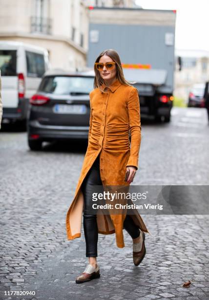 Olivia Palermo is seen wearing orange brown button up dress outside Altuzarra during Paris Fashion Week Womenswear Spring Summer 2020 on September...