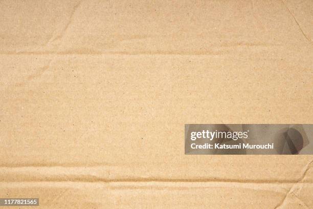 creased cardboard texture background - cardboard texture stock pictures, royalty-free photos & images