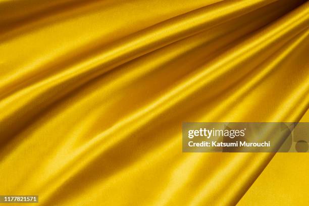 gold satin textured background material - サテン　布 ストックフォトと画像