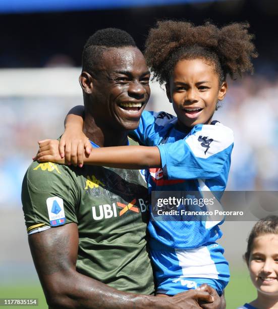 Mario Balotelli of Brescia Calcio and his daughter Pia before the Serie A match between SSC Napoli and Brescia Calcio at Stadio San Paolo on...