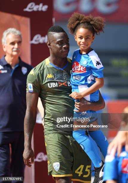 Mario Balotelli of Brescia Calcio with his daughter Pia before the Serie A match between SSC Napoli and Brescia Calcio at Stadio San Paolo on...