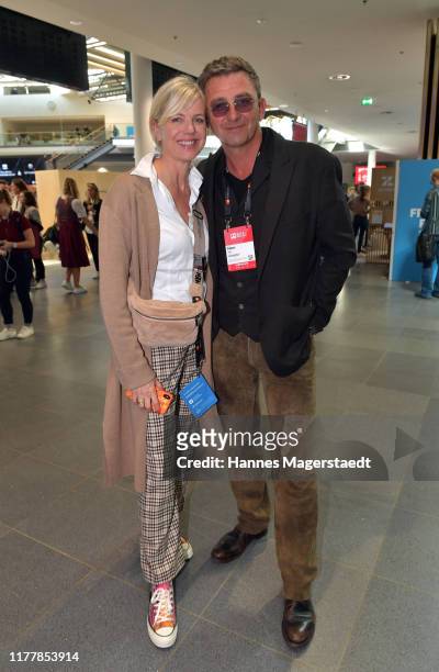 Actor Hans Sigl and his wife Susanne Sigl during the "Bits & Pretzels Founders Festival" at ICM Munich on September 29, 2019 in Munich, Germany. Bits...