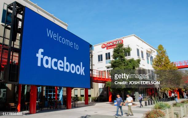 Giant digital sign is seen at Facebook's corporate headquarters campus in Menlo Park, California, on October 23, 2019.
