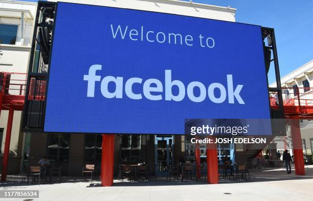 Giant digital sign is seen at Facebook's corporate headquarters campus in Menlo Park, California, on October 23, 2019.