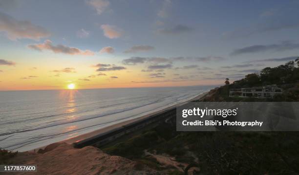sunset moment at the del mar beach - del mar california stock pictures, royalty-free photos & images
