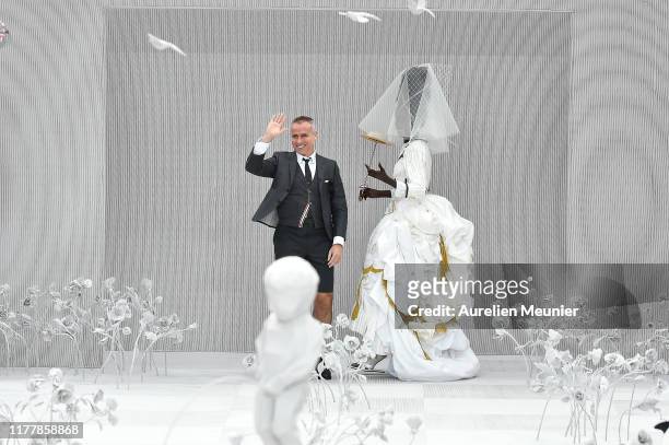 Designer Thom Browne acknowledges the audience during the Thom Browne Womenswear Spring/Summer 2020 show as part of Paris Fashion Week on September...