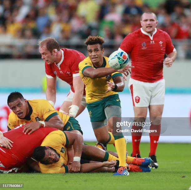 Will Genia of Australia passes the ball during the Rugby World Cup 2019 Group D game between Australia and Wales at Tokyo Stadium on September 29,...