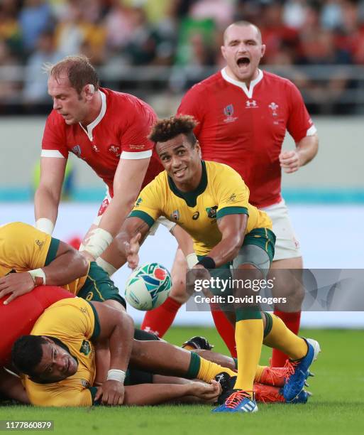 Will Genia of Australia passes the ball during the Rugby World Cup 2019 Group D game between Australia and Wales at Tokyo Stadium on September 29,...