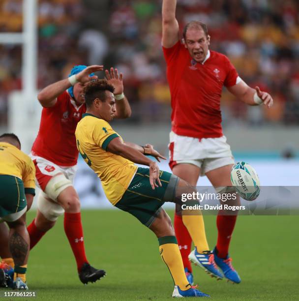 Will Genia of Australia kicks the ball upfield during the Rugby World Cup 2019 Group D game between Australia and Wales at Tokyo Stadium on September...