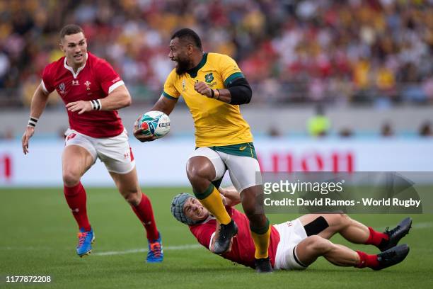 Samu Kerevi of Australia is tackled by Jonathan Davies of Wales during the Rugby World Cup 2019 Group D game between Australia and Wales at Tokyo...