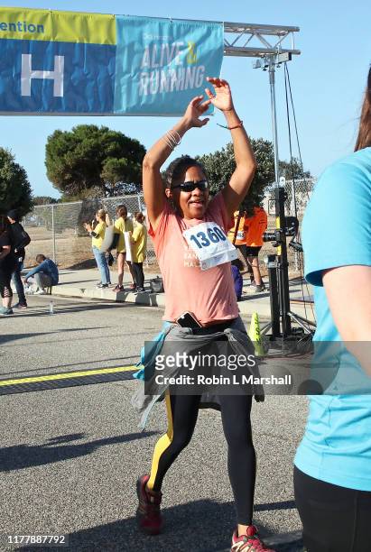 Doria Ragland finishes the 21st Annual Alive And Running 5k For Suicide Prevention on September 29, 2019 in Los Angeles, California.