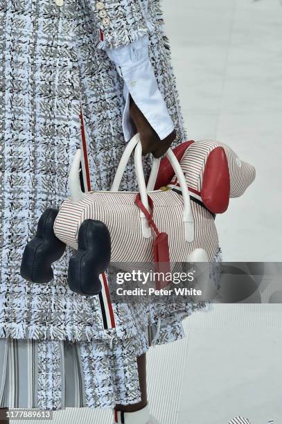 Model, bag detail, walks the runway during the Thom Browne Womenswear Spring/Summer 2020 show as part of Paris Fashion Week on September 29, 2019 in...