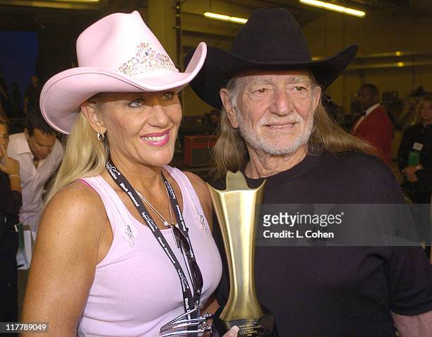 Willie Nelson and guest during 39th Annual Academy of Country Music Awards - Backstage and Audience at Mandalay Bay Resort and Casino in Las Vegas,...