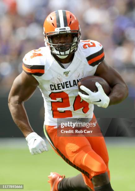 Running back Nick Chubb of the Cleveland Browns carries the ball during the first quarter of the game against the Baltimore Ravens at M&T Bank...