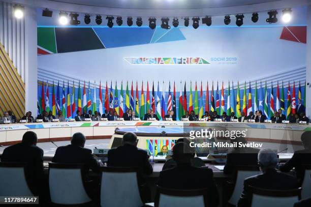 Russian President Vladimir Putin ,Egyptian President Abdel Fattal el-Sisi and South African President Cyril Ramaphosa seen during the plenary at the...