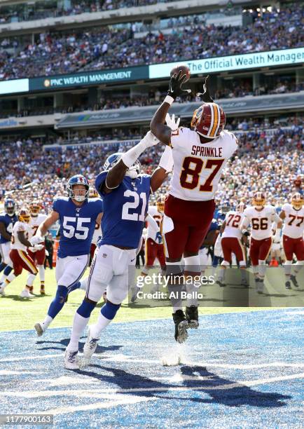 Jabrill Peppers of the New York Giants breaks up a pass in the end zone intended for Jeremy Sprinkle of the Washington Redskins during the first half...