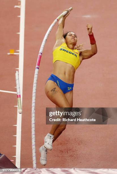 Angelica Bengtsson of Sweden falls as she competes in the women's pole vault final during day three of 17th IAAF World Athletics Championships Doha...