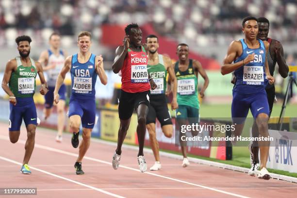 Donavan Brazier of the United States, Emmanuel Kipkurui Korir of Kenya and Marco Arop of Canada compete in the Men's 800 Metres heats during day...