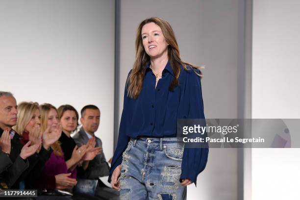 Fashion designer Clare Waight Keller acknowledges the applause of the audience after the Givenchy Womenswear Spring/Summer 2020 show as part of Paris...