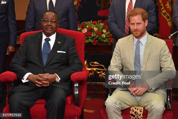 Prince Harry, Duke of Sussex Sussex meets with Professor Arthur Peter Mutharika, President of the Republic of Malawi at the State House on day seven...