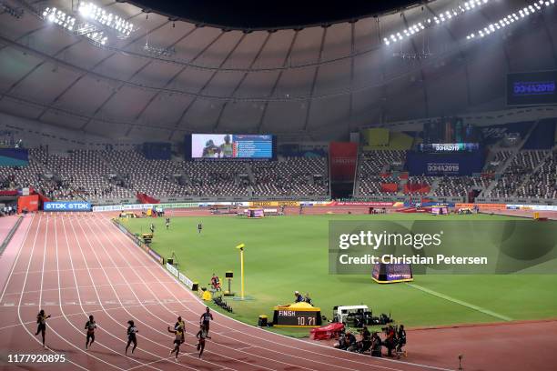 Shelly-Ann Fraser-Pryce of Jamaica, gold, Dina Asher-Smith of Great Britain, silver, and Marie-Josée Ta Lou of the Ivory Coast, bronze, cross the...