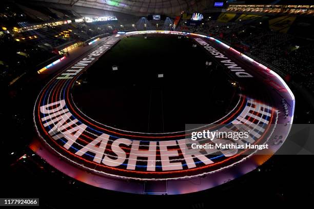 General view as Dina Asher-Smith of Great Britain is introduced for the Women's 100 Metres final during day three of 17th IAAF World Athletics...