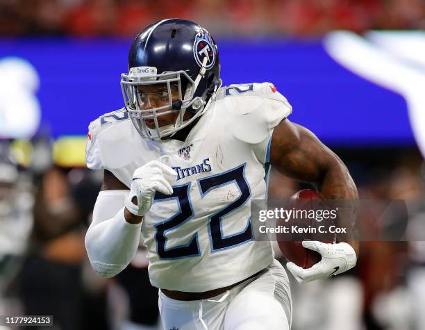 Derrick Henry of the Tennessee Titans rushes against the Atlanta Falcons at Mercedes-Benz Stadium on September 29, 2019 in Atlanta, Georgia.