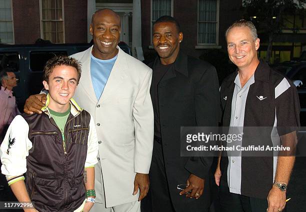 Frankie Muniz, Michael Clarke Duncan, Michael Irvin and Jim Taylor, General Manager of Cadillac