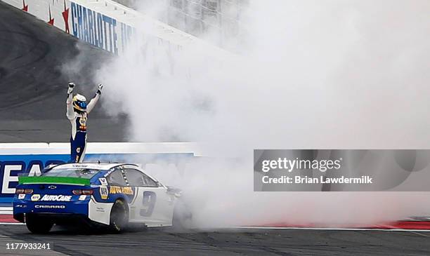 Chase Elliott, driver of the NAPA Auto Parts Chevrolet, celebrates after winning the Monster Energy NASCAR Cup Series Bank of America ROVAL 400 at...