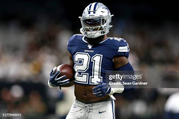 Ezekiel Elliott of the Dallas Cowboys warms up prior to the start of a NFL game against the New Orleans Saints at the Mercedes Benz Superdome on...