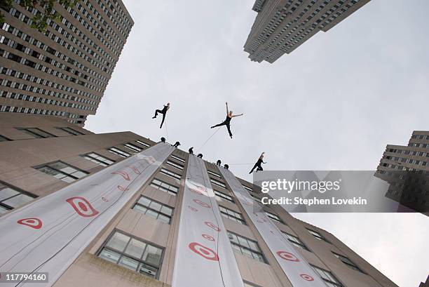 Models coming down 9-story-high vertical runway during Target Debuts Fall 2005 Collection on Nine-Story-High Vertical Runway at Rockefeller Center in...
