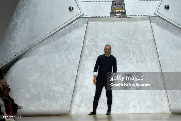 Designer Albert Kriemler acknowledges the audience during the Akris Womenswear Spring/Summer 2020 show as part of Paris Fashion Week on September 29,...