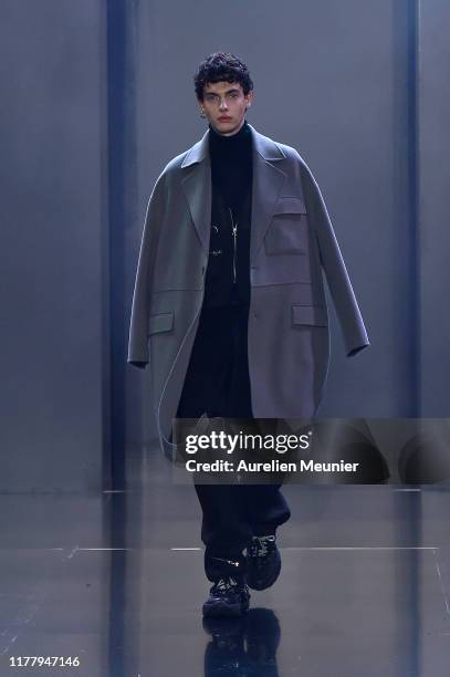 Model walks the runway during the Tmall Cool China Womenswear Spring/Summer 2020 show as part of Paris Fashion Week on September 29, 2019 in Paris,...