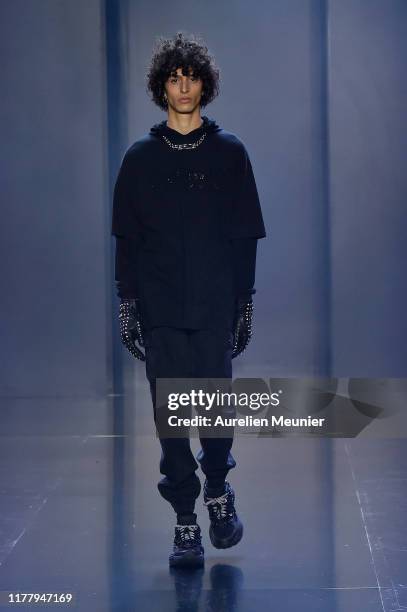 Model walks the runway during the Tmall Cool China Womenswear Spring/Summer 2020 show as part of Paris Fashion Week on September 29, 2019 in Paris,...