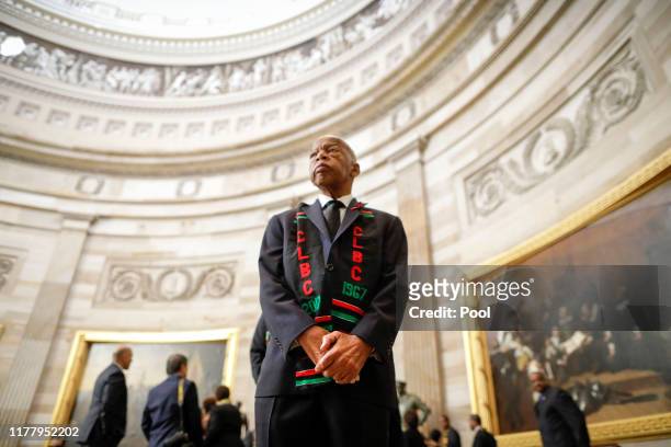 Rep. John Lewis and other members of the Congressional Black Caucus wait to enter as a group to attend the memorial services of U.S. Rep. Elijah...