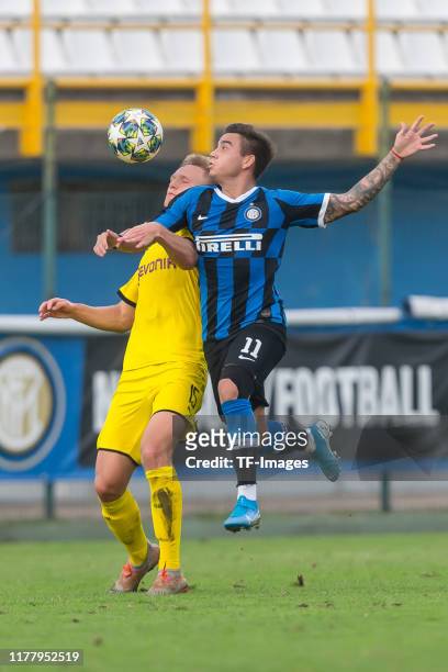 Tim Boehmer of Borussia Dortmund U19 and Matias Fonseca of Inter Mailand U19 battle for the ball during the UEFA Youth League match between Inter...